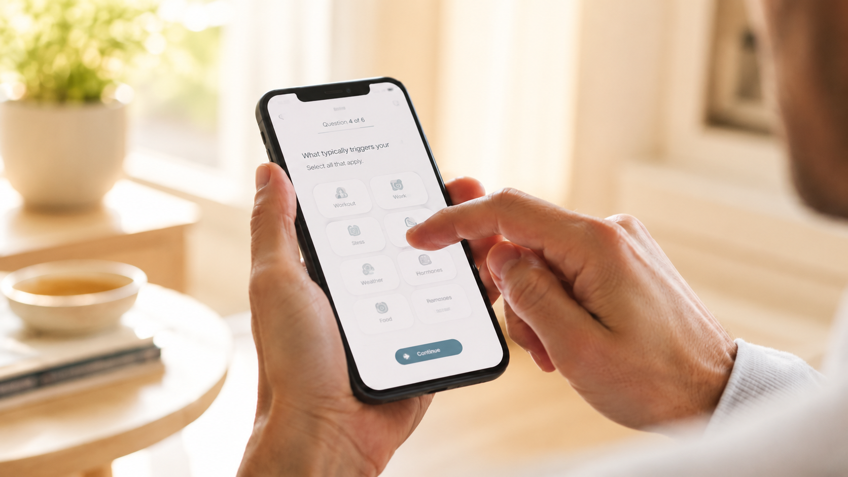 Person selecting pain triggers on a phone
